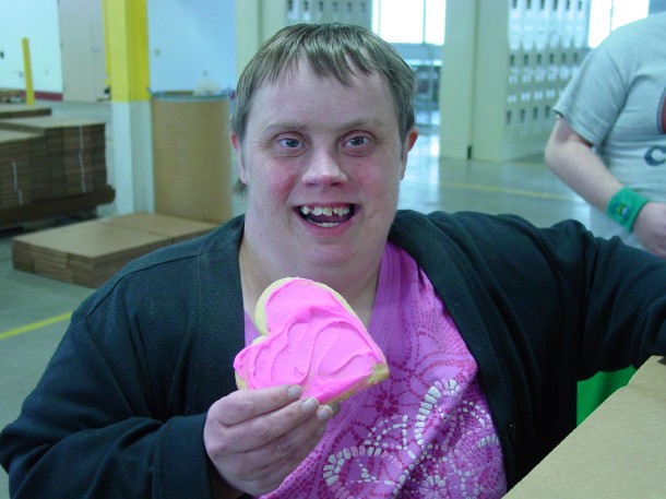 Allison W, is seen here holding one of our delicious cookies.